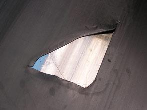 撕裂的输送带 撕裂的输送带